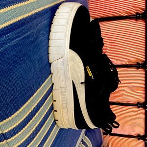 Women’s black platform pumas